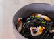 Linguine al nero di seppia, peperoncino, seppie e lime